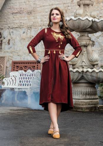 Grab This Pretty Rich And Elegant Looking Kurti In Maroon Color Fabricated On Art  Silk. It Is Beautified With Thread Embroidery Over the Yoke. This Kurti Is Light In Weight And Easy To Carry All Day Long.  