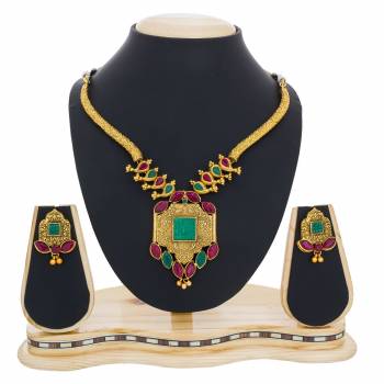 Simple and Elegant Looking Necklace Set Is Here Golden Color Beautified With Pink And Green Colored Stones. This Necklace set Be Paired With Any Traditonal Attire. Buy Now.