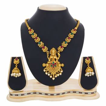 Beautifully Crafted Necklace Set Is Here In Golden Color Beautified With Stone Work And Holy Picture Craved Over It. This Traditonal Necklace set Will Earn You Lots Of Compliments From Onlookers.