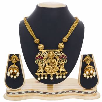 Beautifully Crafted Necklace Set Is Here In Golden Color Beautified With Stone Work And Holy Picture Craved Over It. This Traditonal Necklace set Will Earn You Lots Of Compliments From Onlookers.