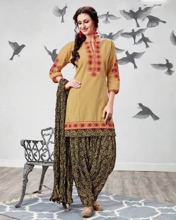 Simple and Elegant Looking Readymade Patiyala Suit Is Here Which Available In Many Sizes. Its Top Is In Beige Color Paired With Black Colored Patiyala Salwar And Dupatta. Its Top, Bottom And Dupatta Are Fabricated On Cotton Beautified With Prints And Thread Work Over The Top.