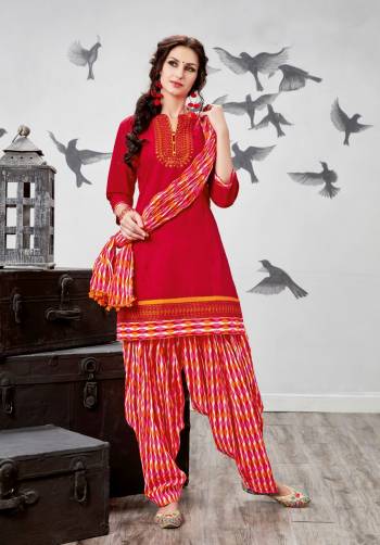 Adorn The Angelic Look Wearing This Patiyala Suit In Red Color Paired With Multi Colored Bottom And Dupatta. Its Top, Bottom And Dupatta Are Fabricated On Cotton  Which IS Soft Towards Skin And Easy To Carry All Day Long.