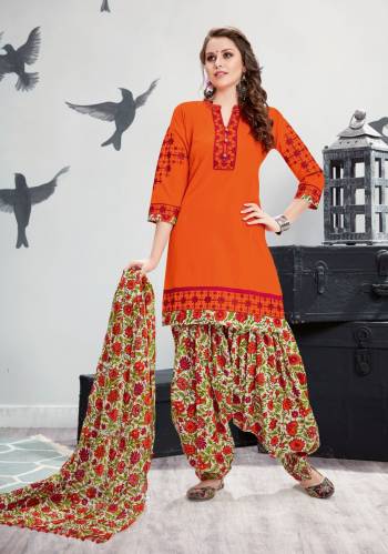 Orange Color Induces Perefct Summery Appeal To Any Outfit And So Here Is A Perefct Readymade Suit For Your Casual Wear In Orange Colored Top Paired With Multi Colored Bottom And Dupatta. Its Top, Bottom And Dupatta Are Fabriacted On Cotton. Buy This Now.