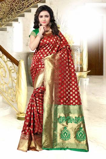 For Rich Look, Grab This Saree In Maroon Color Paired With Contrasting Green Colored Blouse. This Saree And Blouse Are Fabricated On Banarasi Art Silk Beautified With Weave. Its Color And Fabric Will Give A Rich Look To Your Personality. Buy Now.