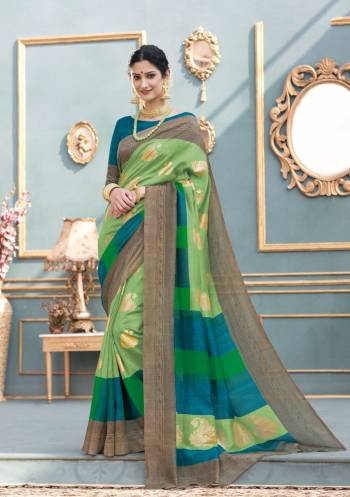 Cool Colors Are Combined Very Beautifully In This Designer Saree. This Saree Is In Green Paired With Contrasting Teal Blue Colored Blouse. This Saree And Blouse Are Fabricated On Tussar Art Silk. Buy This Saree Now.