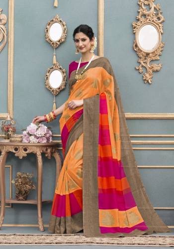 Orange Color Induces Perfect Summery Appeal To Any Outfit, So Grab This Saree In Orange Color Paired With Contrasting Rani Pink Colored Blouse. This Saree And Blouse Are Fabricated On Tussar Art Silk Which Is Durable And Easy To Care For.