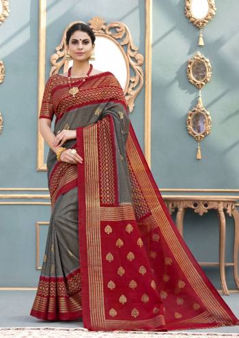 Adorn The Royal Look Wearing This Elegant Saree In Dark Grey And Maroon Color Paired With Maroon Colored Blouse. This Saree And Blouse Are Fabricated On Tussar Art Silk Beautified With Very Less Prints. Buy This Saree Now.