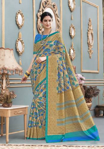 Rich and Elegant Looking Saree Is Here With This Beige Colored Saree Paired With Contrasting Blue Colored Blouse. This Saree And Blouse Are Fabricated On Tussar Art Silk Which Has Contrasting Colored Prints. Buy Now.