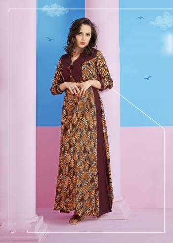 Add This Kurti to Your Wardrobe In Brown Color Fabricated On Rayon Cotton. This Kurti Is Beautified With Prints And Also It Is Soft Towards Skin And Easy To Carry All Day Long.