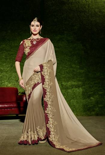 Look gorgeous in this beautiful printed beige color shaded bright georgette saree. Ideal for party, festive & social gatherings. this gorgeous saree featuring a beautiful mix of designs. Its attractive color and designer floral design, stone work over the attire & contrast hemline adds to the look. Comes along with a contrast unstitched blouse.