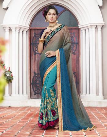 Grab This Multi Colored Designer Saree For Any Functions, Parties Or Occasions. This Saree Is Beautified On Self Jacquard ,  Silk.Buy This Majestic Creation Now.