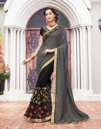 Complete Your Ethnic Diva Look Wearing This  Designer Grey And Black Colored Saree At Social Parties And Functions. This Classy Saree Is Beautified On Self Jacquard , Georgette With Banglori Silk Blouse.Wear It & Get Adorable Look.