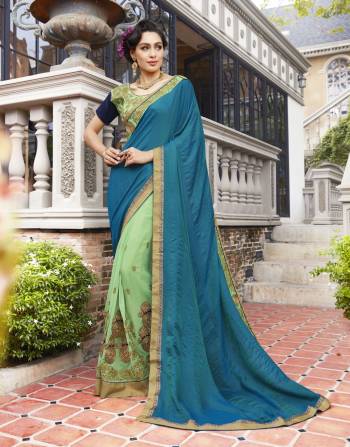 Get This Teal Blue And Green Colored Saree And Enjoy Getting The Centre Of Attraction At The Party Or Function You Attend. This Amazing Saree Is  Fashioned On Self Jacquard , Georgette Is Coupled With Green , Navy Blue Colored Banglori Silk Blouse. This Saree Is Specially Designed For You Lady.