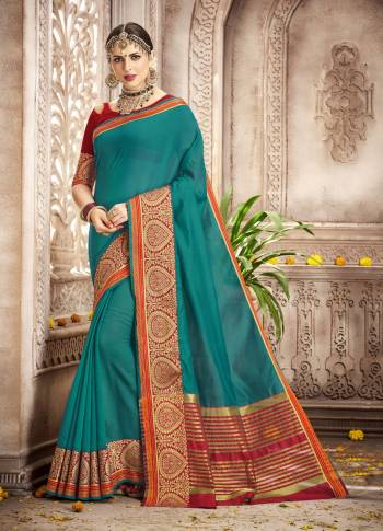 Teal Green Color Induces Perfect Summery Appeal To Any Outfit. Grab This Teal Green Colored Saree Paired With Red Colored Blouse. This Saree And Blouse Are Fabricated On Cotton Silk Which IS Light In Weight And Easy To Carry All Day Long.