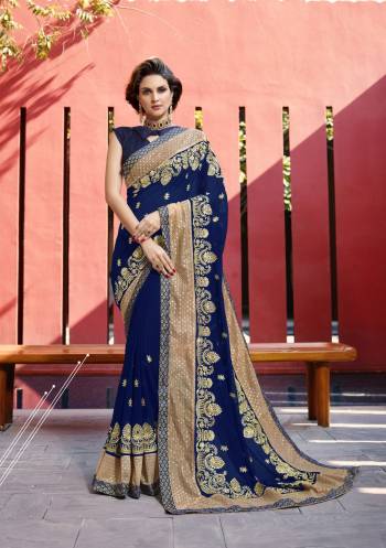 Shine Bright Wearing This Saree In Royal Blue Color Paired With Rayol Blue Colored Blouse. This Saree Is Fabricated On Georgette Paired With Art Silk Fabricated Blouse. It Is Beautified With Jari Embroidery Which Gives A Saree Heavy Look.