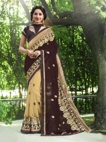 Another Rich And Elegant Saree Is Here In Brown And Beige Color Paired With Dark Brown Colored Blouse. This Saree Is Fabricated On Georgette Paired With Art Silk Fabricated Blouse. It Is Light Weight And easy To Carry All Day Long.