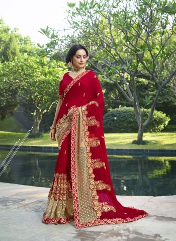 Adorn The Angelic Look Wearing This Pretty Saree In Red Color Paired With Red Colored Blouse. This Saree Is Fabricated On Georgette Paired With Art Silk Fabricated Blouse. It Is Light In Weight And Ensures Superb Comfort all Day Long.