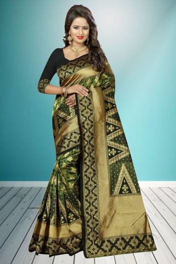 Add This Unique Color In Banarasi Saree With Gold And Green Color Paired With Dark Green Colored Blouse. This Saree And Blouse Are Fabricated On Banarasi Art Silk Beautified With Rapier Jacquard Work, It Is Light In Weight And Easy To Carry All Day Long. 