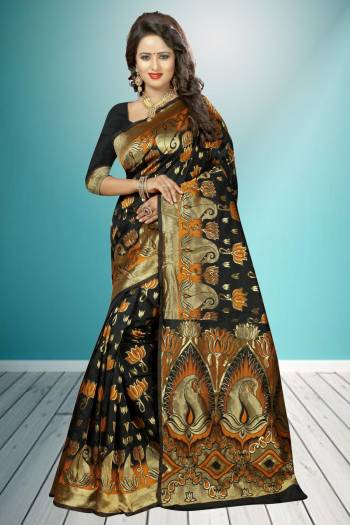 Enhance Your Beauty Wearing This Black Colored Saree Paired With Black Colored Blouse. This Saree And Blouse are Fabricated On Banarasi Art Silk Beautified With Jacquard Work All Over. Buy This Lovely Saree Now.