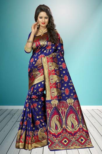 Look Even More Beautiful In this Pretty Banarasi Saree In Blue Color Paired With Blue Colored Blouse. This Saree And Blouse Are Fabricated On Banarasi Art Silk Beautified With Rapier Jacquard Work All Over. Buy This Saree Now.