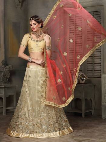 Simple And Elegant Looking Lehenga Choli Is Here In Cream Color Paired With Contrasting Pink Colored Dupatta. Its Blouse Is Fabricated On Art Silk Paired With Net Dabricated Lehenga And Dupatta. Its Rich Color Will Give Rich Look To Your Personality.