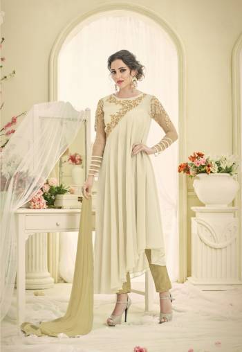 Here Is a Designer Assymetric Patterned Suit In Off-White Color Paired With Beige Colored Bottom And Dupatta. Its Top Is Fabricated On Georgette Paired With Santoon Bottom And Chiffon Dupatta. This Suit Ensures Superb Comfort All Day Long. 