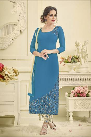 Celebrate This Festive Season Wearing This Straight Cut Suit In Blue Colored Top Paired With Off-White Colored Bottom And Dupatta. Its Top Is Fabricated On Georgette Paired With Santoon Bottom And Chiffon Dupatta. It Is Light Weight And Ensures Superb Comfort All Day Long.