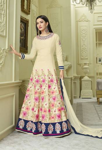 Grab This Designer Floor Length Suit For The Upcoming Function At Your Place With This Off-White Colored Floor Length Top Paired With Off-White Colored Bottom And Dupatta. Its Top Is Fabricated On Art Silk Paired With Santoon Bottom And Chiffon Dupatta.  It Is Light In Weight And Easy To Carry All Day Long.