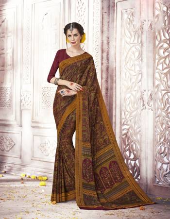 Go Colorful Wearing This Saree In Multi Color Paired With Maroon Colored Blouse. This Saree And Blouse Are Fabricated On Crepe Silk Beautified With Prints All Over It. It Is Durable And Easy To Carry All Day Long.