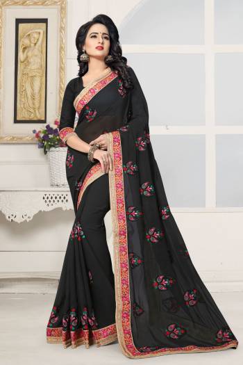 Enhance Your Beauty Wearing This Saree In Black Color Paired With Black Colored Blouse. This Saree And Blouse Are Fabricated On Georgette Beautified With Resham Embroidery And Stone Work. This Saree Is Light Weight And easy To Carry All Day Long.