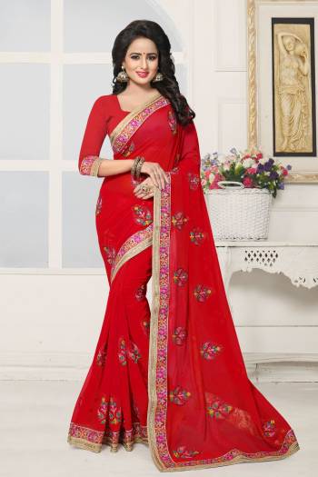 Adorn The Angelic Look Wearing This Saree In Red Color Paired With Red Colored Blouse. This Saree And Blouse Are Fabricated On Georgette Which Is Light Weight And Easy To Drape. Buy This Saree Now.