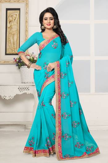 Grab This Beautiful Shade Of Blue With This Saree In Turquoise Blue Color Paired With Turquoise Blue Colored Blouse. This Saree And Blouse Are Fabricated On Georgette Which Is Light In Weight And Also Easy To Carry All Day Long.