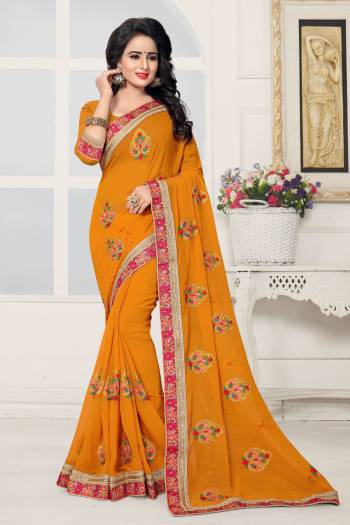 Celebrate This Festive Season Wearing This Saree In Musturd Yellow Color Paired With Musturd Yellow Colored Blouse. This Saree And Blouse Are Fabricated On Georgette Beautified With Embroidery. It Is Light Weight And Easy To Carry Throughout The Gala.