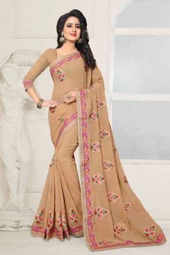 Flaunt Your Rich And Elegant Taste Wearing This Saree In Beige Color Paired With Beige Colored Blouse, This Saree And Blouse Are Fabricated On Georgette Beautified With Resham Embroidery. This Saree Will Give A Rich And Elegant Look To Your Personality. Buy It Now.