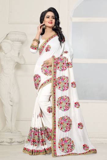 Simple And Elegant Looking Saree Is Here With This Pretty Saree In White Color Paired With White Colored Blouse. This Saree And Blouse Are Fabricated On Art Silk Beautified With Multi Colored Embroidery. Buy Now.