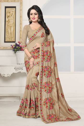 Rich And Elegant Looking Saree In Beige Color Paired With Beige Colored Blouse. This Saree And Blouse Are Fabricated On Art Silk  Beautified With Multi Colored Thread Embroidery. This Saree Ensures Superb Comfort All Day Long. Buy This Saree Now.