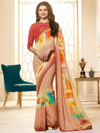 A Very Pretty Designer Saree Is Here With An Elegant Looking Color Combination With Peach Colored Saree Paired With Dark Pink Colored Blouse. This Printed Saree Is Fabricated On Georgette Paired With Art Silk Fabricated Embroidered Blouse. This saree Will Definitely Earn You Lots Of Compliments From Onlookers.