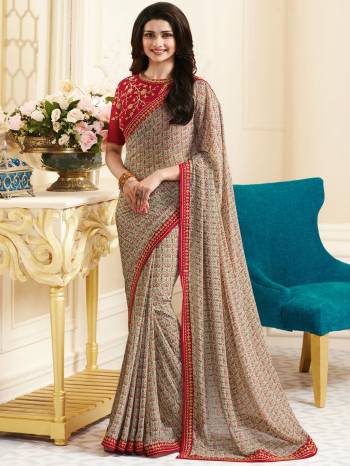 Rich and Elegant Looking Designer Saree Is Here With This Pretty Grey Colored Saree Paired With Contrasting Maroon Colored Blouse. This Saree Is Fabricated On Georgette Paired With Art Silk Fabricated Blouse. This saree Will Earn You Lots Of Compliments From Onlookers.