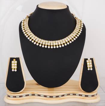 Be It A Simple Kurti Or Heavy Dress, You Can This Elegant Necklace Set With Any Of Your Attire. It Is Beautified With Stone And Pearls. Buy It Now.