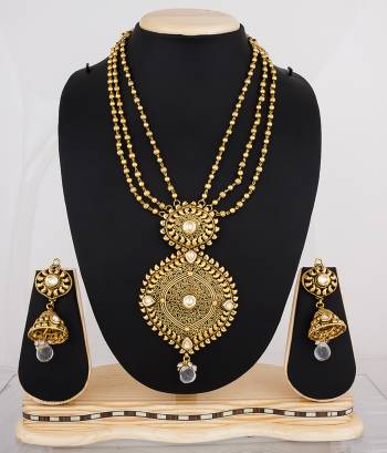 If Layers Is Your Choice Than Grab This Pretty Necklace Set With Multiple Chains Paired With Jhumki Style Earrings. 