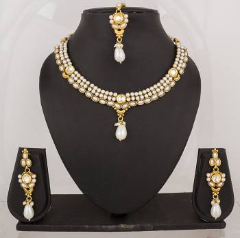 For That White Colored Dress, Here Is The Perfect Necklace Set In Golden Color Beautified with Pearls all Over. Pair This Up With White OR Any Colored Attire. Buy Now.