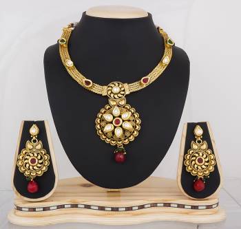 Look Pretty Wearing This Necklace Set With Maroon Or Any Contrasting Colored Traditional Attire. This Necklace Set Is Made On Copper So It Is Light In Weight And Easy To Carry All Day Long.