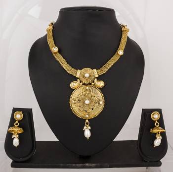 This Wedding Season, Flaunt Your Rich Taste In Jewellery With This Necklace Set In Golden Color Made By Copper. This Necklace Set Is Light Weight And easy To Carry Throughout The Gala.