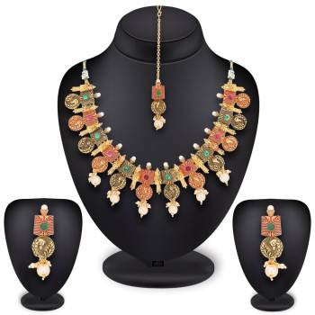 Adorn The Pure Traditional Look With This Beautiful Necklace Set In Multi Color Made On Mix Metal. This Uniwue Necklace Set Is Beautified With Multi Colored Stones And Pearls. Buy This Set Now.