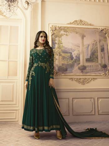 Grab This Lovely Sahde Of Green With This Pine Green Colored Designer Floor Length Suit Paired With Pine Green Colored Bottom And Dupatta. Its Top Is Fabricated On Georgette Paired With Santoon Bottom And Chiffon Dupatta. Its Beautiful E,broidery Over The Yoke Will Earn You Lots Of Compliments From Onlookers. Buy Now.