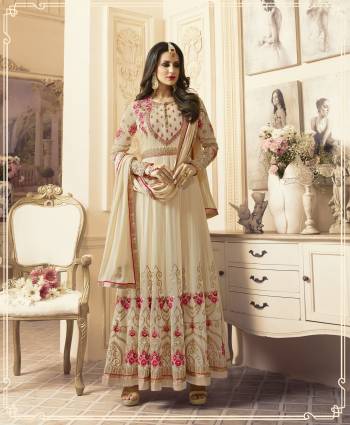 Celebrate This Festive Season With This Designer Floor Length Suit In Cream Color Paired With Cream Colored Bottom And Dupatta. Its Top Is Fabricated On Georgette Paired With Santoon Bottom And Dupatta. Its Has Contrasting embroidery All Over The Top Making The Suit Attractive. Buy Now.