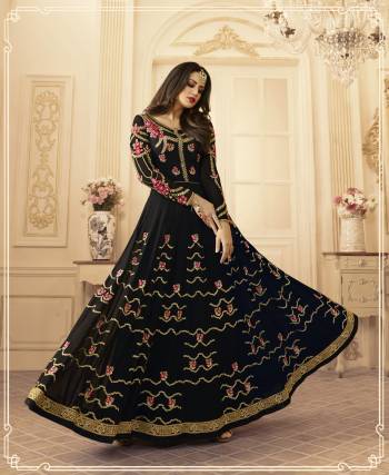 Enhance Your Beauty Wearing This Lovely Black Colored Designer Floor Length Suit Paired With Black Colored Bottom And Dupatta. Its Top Is Fabricated On Georgette Paired With Santoon Bottom And Chiffon Dupatta. Its Heavy Embroidery With Jari And Resham Will Give A Pretty Look Like NEver Before. Buy It Now.