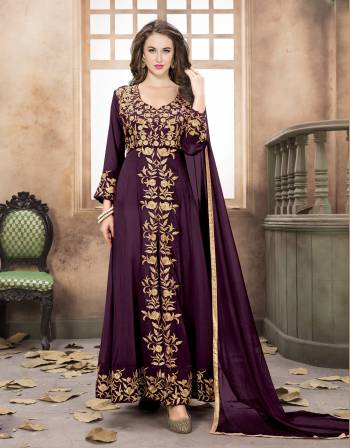 Add New And Beautiful Color To Your Wardrobe In Wine Colored Indo-Western Suit Paired With Wine Colored Bottom And Dupatta. Its Top Is Fabricated On Georgette Paired With Embroidered Pants And Chiffon Dupatta. This Suit Will Definitely Earn You Lots Of Compliments From Onlookers. 