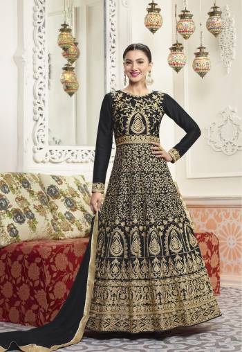 Enhance Your Beauty With This Designer Floor Length Suit In Black Color Paired With Black Colored Bottom And Dupatta. Its Top Is Fabricated On Art Silk Paired With Santoon Bottom And Chiffon Dupatta. This Attractive Suit Will Definetily Earn You Lots Of Compliments From Onlookers.