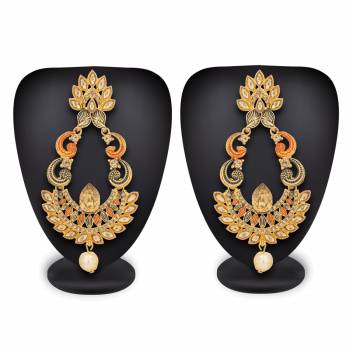 Pair Up This Beautiful Designer Earrings Set In Golden Color Which Can Be Paired With Any Colored Traditonal Attire. Buy This Set Now.